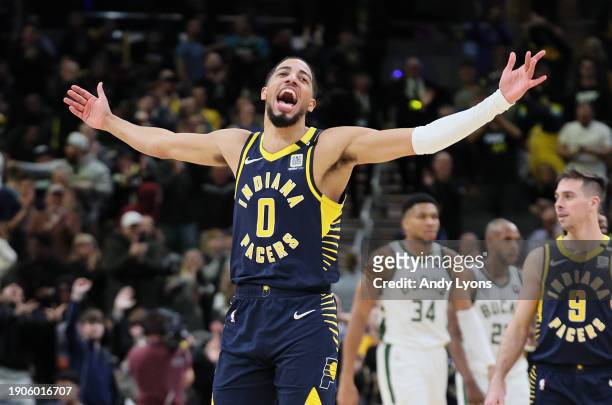 Tyrese Haliburton of the Indiana Pacers celebrates in the fourth quarter of the 142-130 win against the Milwaukee Bucks at Gainbridge Fieldhouse on...