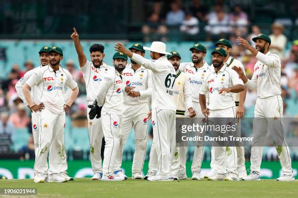 Aamer Jamal of Pakistan celebrates the wicket of Usman Khawaja of Australia during day two of the Men's Third Test Match in the series between...