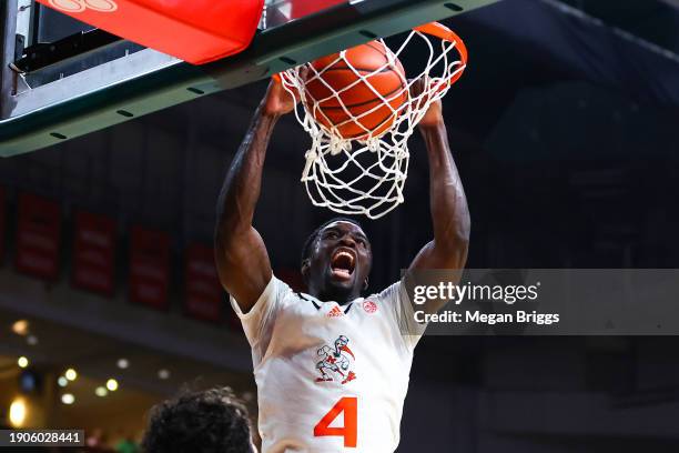 Bensley Joseph of the Miami Hurricanes dunks the ball against the Clemson Tigers during the second half at Watsco Center on January 03, 2024 in Coral...