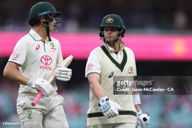 Marnus Labuschagne and Steve Smith of Australia walk off the field as play is suspended due to bad light during day two of the Men's Third Test Match...