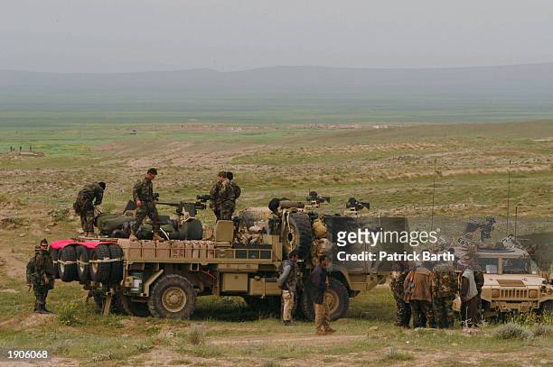 Soldiers of Joint Special Operations Task Force - North at the front line April 8, 2003 in Northern Iraq. Kurdish Peshmergas and U.S. Special forces...