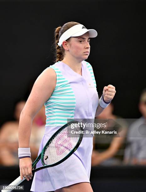 Jelena Ostapenko of Latvia celebrates after winning the first set in her match against Karolina Pliskova of the Czech Republic during day five of the...