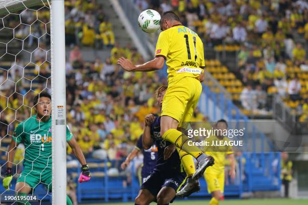 Diego Oliveira of Sanfrecce Hiroshima heads to score the team's second goal during the J.League J1 second stage match between Kashiwa Reysol and...