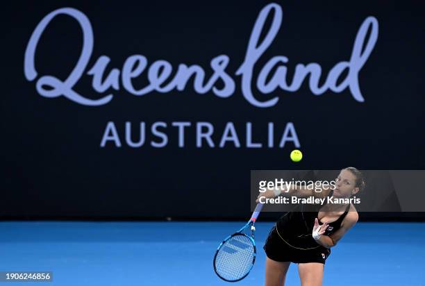 Karolina Pliskova of the Czech Republic serves in her match against Jelena Ostapenko of Latvia during day five of the 2024 Brisbane International at...