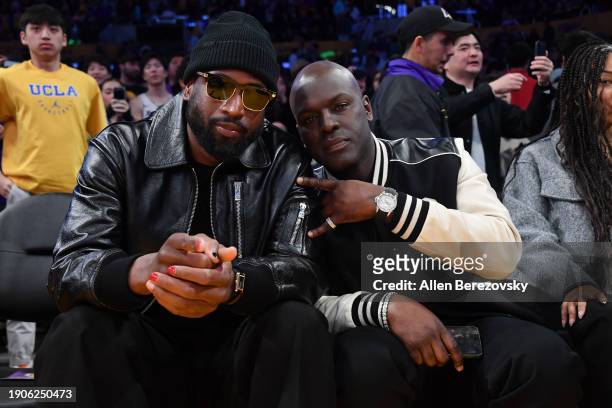 Dwyane Wade and Corey Gamble attend a basketball game between the Los Angeles Lakers and the Miami Heat at Crypto.com Arena on January 03, 2024 in...
