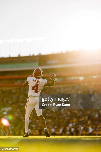 Quarterback Jalen Milroe of the Alabama Crimson Tide looks to throw a pass on the sideline during the CFP Semifinal Rose Bowl Game against the...