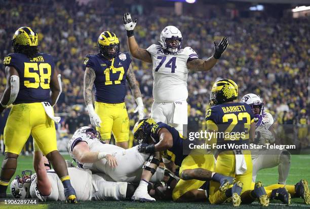 One year after being upset by TCU in the college football playoffs in the Fiesta Bowl, Michigan is in the national title game; the players were...