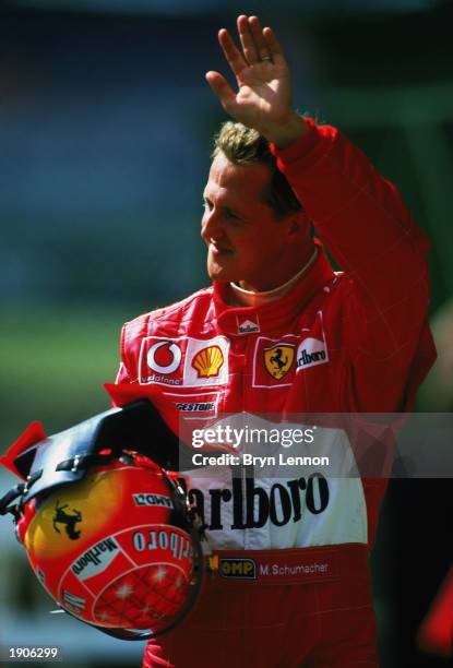 Michael Schumacher of Germany and Ferrari waving to fans during the Formula One Brazilian Grand Prix held on April 6, 2003 at Interlagos, Sao Paulo,...