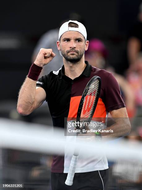 Grigor Dimitrov of Bulgaria celebrates victory after his match against Daniel Altmaier of Germany during day five of the 2024 Brisbane International...