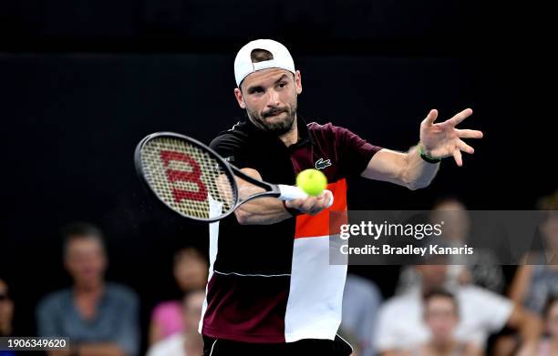 Grigor Dimitrov of Bulgaria plays a forehand in his match against Daniel Altmaier of Germany during day five of the 2024 Brisbane International at...