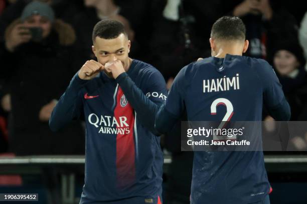 Kylian Mbappe of PSG celebrates his goal with Achraf Hakimi of PSG during the Trophee des Champions between Paris Saint-Germain and Toulouse FC at...