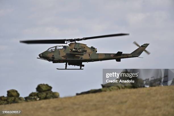 Japan's Self-Defense Forces 1st Airborne Brigade conduct descent training with allies US, UK, Canada, France, Germany and Philippines on January 7 at...