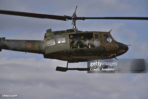 Japan's Self-Defense Forces 1st Airborne Brigade conduct descent training with allies US, UK, Canada, France, Germany and Philippines on January 7 at...