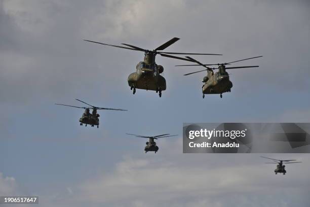 Japan's Self-Defense Forces 1st Airborne Brigade conduct descent training with allies US, UK, Canada, France, Germany and Philippines on January 7 at...