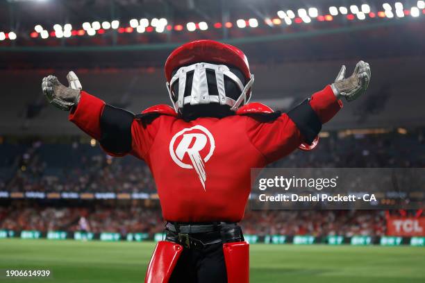 The Renegades mascot celebrates a six with fans during the BBL match between Melbourne Renegades and Hobart Hurricanes at Marvel Stadium, on January...