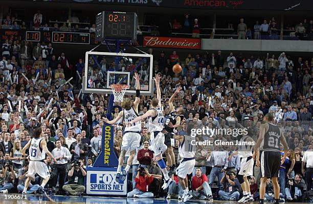 Tony Parker of the San Antonio Spurs shoots a running finger roll for the win against the Dallas Mavericks during the game at American Airlines...