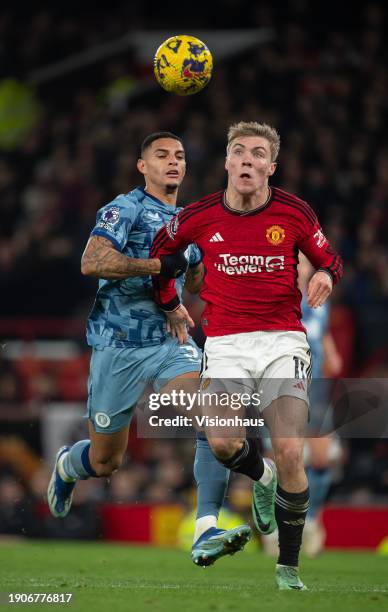 Rasmus Hojlund of Manchester United and Diego Carlos of Aston Villa in action during the Premier League match between Manchester United and Aston...