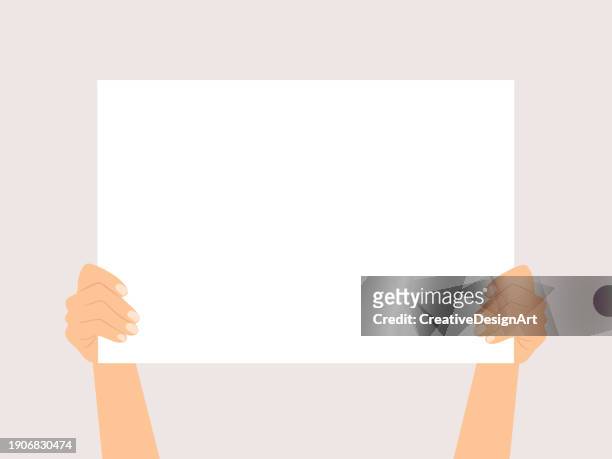 hands holding blank paper or placard. template for announce and advertising - person holding blank piece of paper stock illustrations