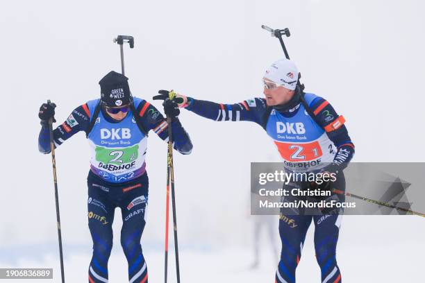 Eric Perrot of France takes over from Fabien Claude of France during the Men's Relay at the BMW IBU World Cup Biathlon Oberhof on January 7, 2024 in...