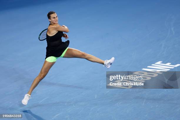 Aryna Sabalenka of Belarus plays a forehand in her match against Zhu Lin of China during day five of the 2024 Brisbane International at Queensland...