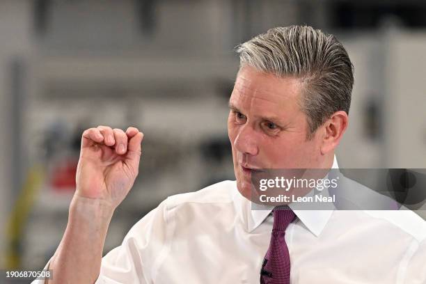 Labour Party leader Keir Starmer makes a gesture as he talks about the darts World Championship during a speech at the National Composites Centre in...