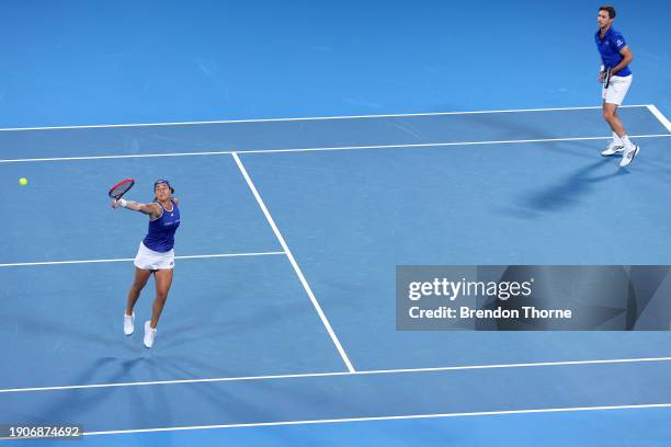 Edouard Roger-Vasselin and Caroline Garcia of France compete in their quarter-final match against Casper Rudd and Ulrikke Eikeri of Norway during the...