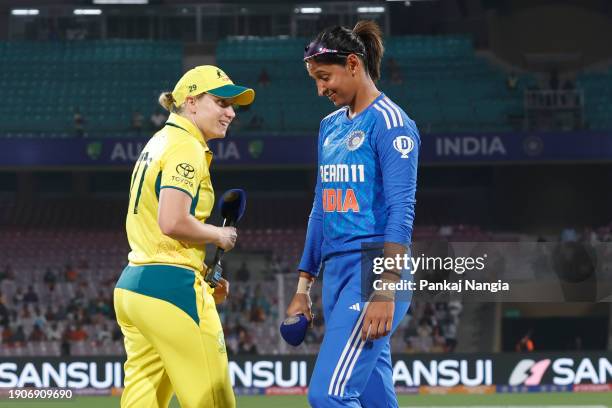 Alyssa Healy of Australia and Harmanpreet Kaur of India at the toss during game two of the women's T20I series between India and Australia at DY...