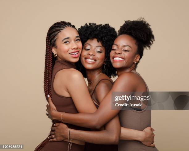portrait of happy three young women - kinky stock pictures, royalty-free photos & images