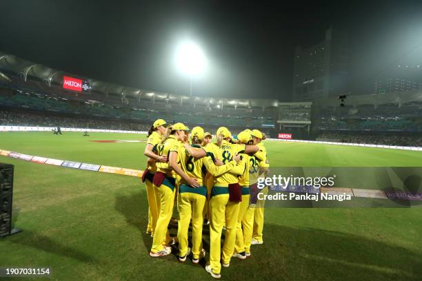 Players of Australia make a huddle during game two of the women's T20I series between India and Australia at DY Patil Stadium on January 7, 2024 in...