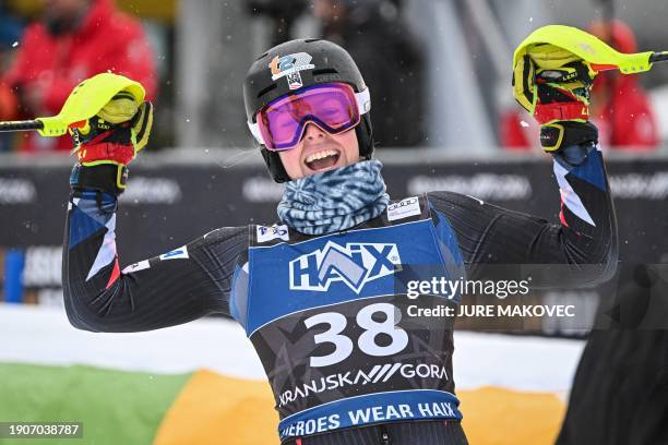 Third-placed US AJ Hurt reacts in the finish area of the Slalom event of the Women's FIS Alpine Skiing World Cup in Kranjska Gora, Slovenia, on...