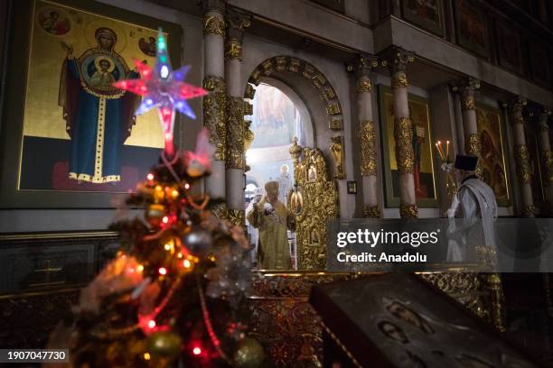 The faithful gather for Christmas service at the Church of the Nativity in Krasnoyarsk, Russia on January 07, 2024. Metropolitan Panteleimon of...