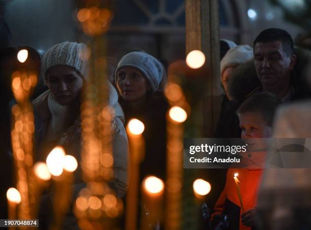 The faithful gather for Christmas service at the Church of the Nativity in Krasnoyarsk, Russia on January 06, 2024. Metropolitan Panteleimon of...