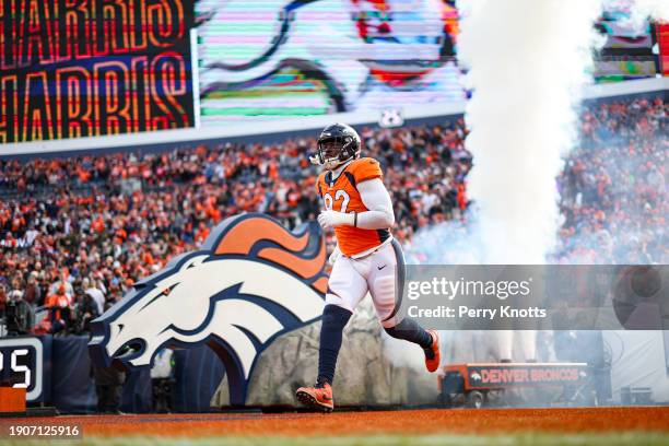 Jonathan Harris of the Denver Broncos runs out of the tunnel prior to an NFL football game against the Los Angeles Chargers at Empower Field at Mile...