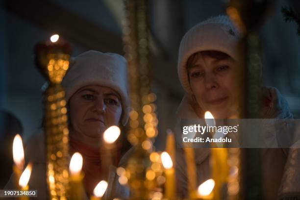 The faithful gather for Christmas service at the Church of the Nativity in Krasnoyarsk, Russia on January 07, 2024. Metropolitan Panteleimon of...