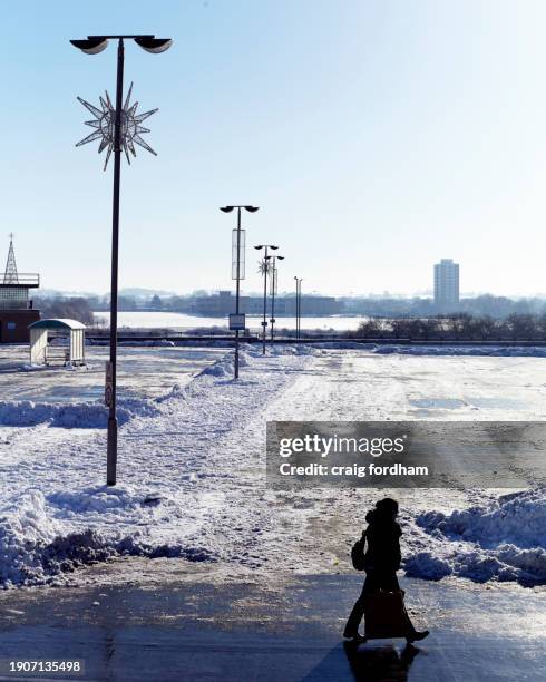 bleak town in winter. - solar street light stock pictures, royalty-free photos & images