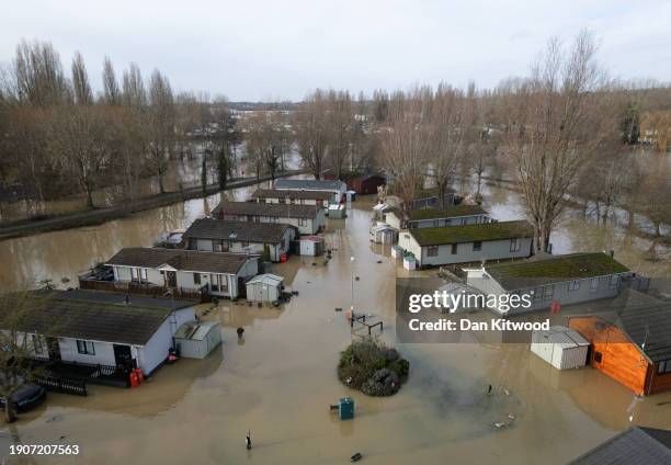 In this aerial view, water levels at Billings Aquadome holiday park begin to subside after flooding on January 04, 2024 in Northampton, United...