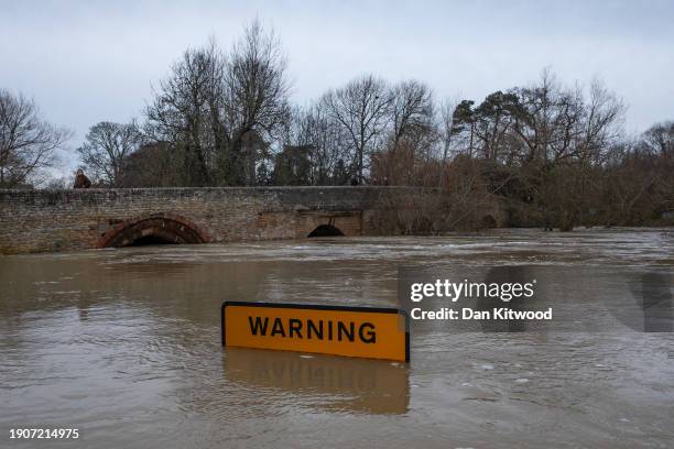 Water levels remain high after the River Great Ouse burst its banks on January 04, 2024 in Harrold, United Kingdom. New flood warnings have been...