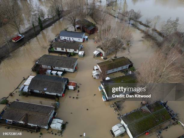 In this aerial view, water levels at Billings Aquadome holiday park begin to subside after flooding on January 04, 2024 in Northampton, United...