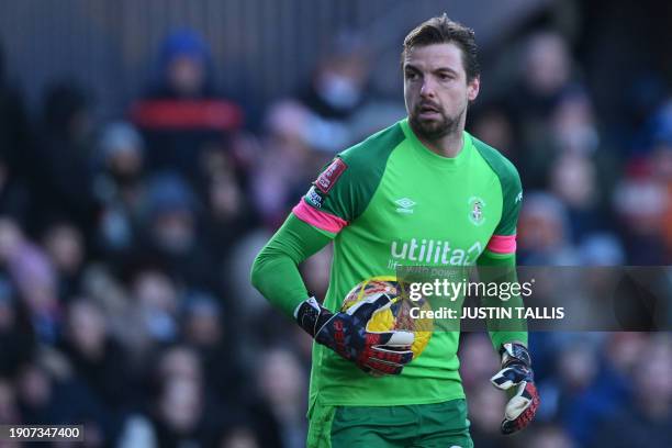 Luton Town's Dutch goalkeeper Tim Krul collects the ball during the English FA Cup third round football match between Luton Town and Bolton Wanderers...