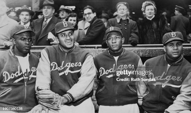 Jackie Robinson Second Baseman, Don Newcombe Pitcher, Dan Bankhead Pitcher and Roy Campanella Catcher of the National League Brooklyn Dodgers before...