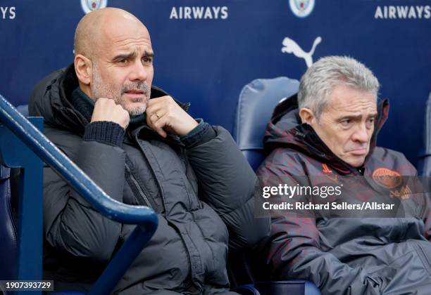 Pep Guardiola, Manager of Manchester City and Juanma Lillo Assistant Manager during the Emirates FA Cup Third Round match between Manchester City and...