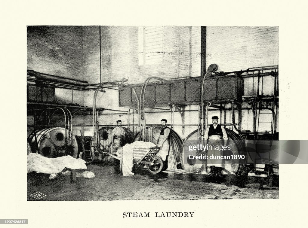 Workers cleaning sheet in the steam laundry of Royal Naval Hospital Haslar, Gosport, Hampshire, 1890s