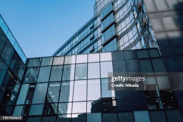 corporate buildings skyscraper with reflection - skyscraper abstract stock pictures, royalty-free photos & images