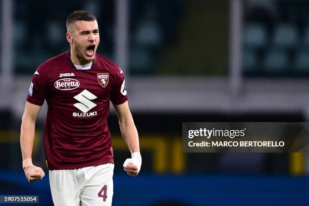 Torino's Italian defender Alessandro Buongiorno celebrates after he scored the third goal of his team during the Italian Serie A football match...