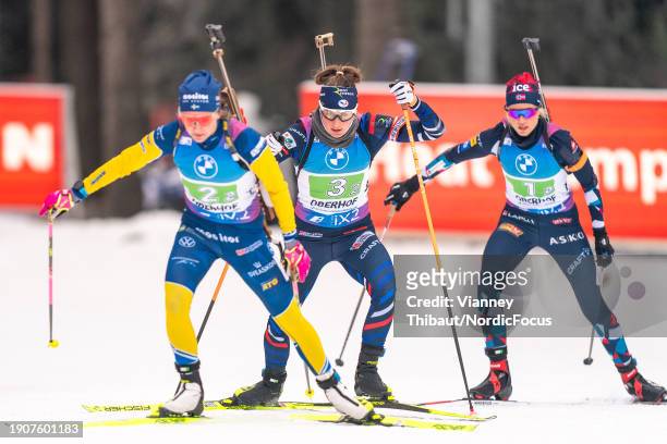 Linn Persson of Sweden takes third place, Justine Braisaz-Bouchet of France takes first place, Marit Ishol Skogan of Norway takes second place during...