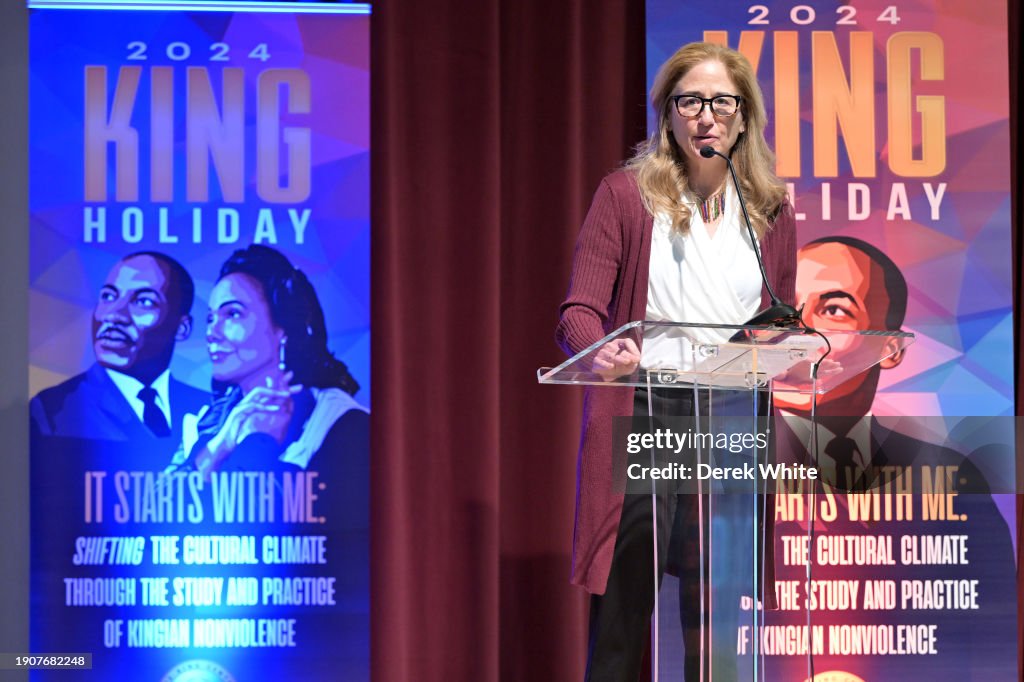 Jill Savitt speaks onstage during the 2024 King Holiday observance Jill Savitt speaks onstage during the 2024 King Holiday observance