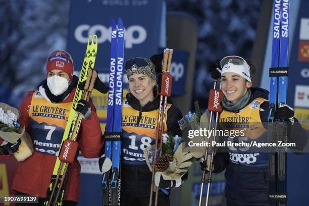 Sophia Laukli takes 1st place, Heidi Weng of Team Norway takes 2nd place, Delphine Claudel of Team France takes 3rd place during the FIS Cross...