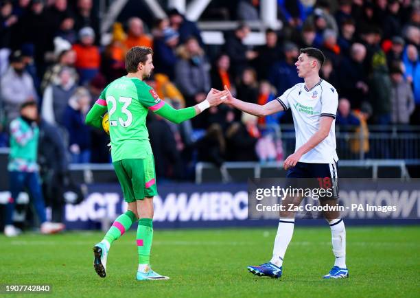 Luton Town goalkeeper Tim Krul shakes hands with Bolton Wanderers' Eoin Toal at the end of the Emirates FA Cup Third Round match at Kenilworth Road,...