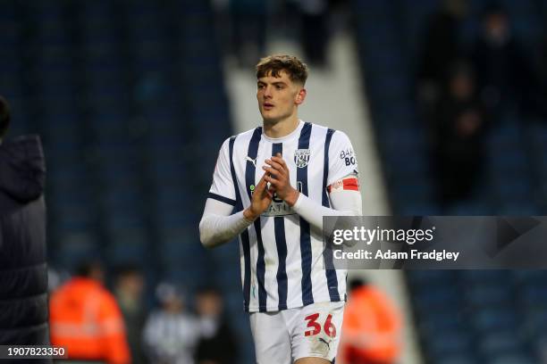 Caleb Taylor of West Bromwich Albion applauds the West Bromwich Albion fans after the final whistle in the Emirates FA Cup Third Round match between...