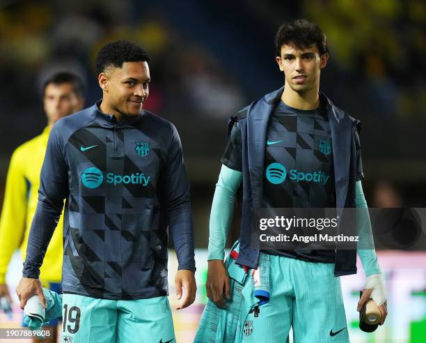 Vitor Roque and Joao Felix of FC Barcelona interact prior to the LaLiga EA Sports match between UD Las Palmas and FC Barcelona at Estadio Gran...